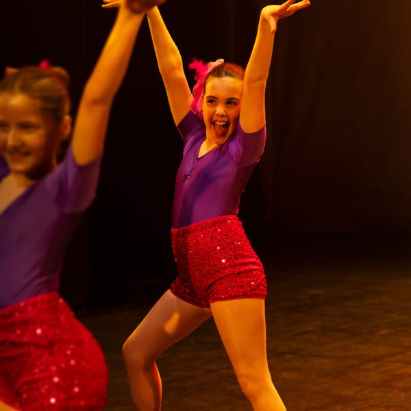Young dancers backstage in costume